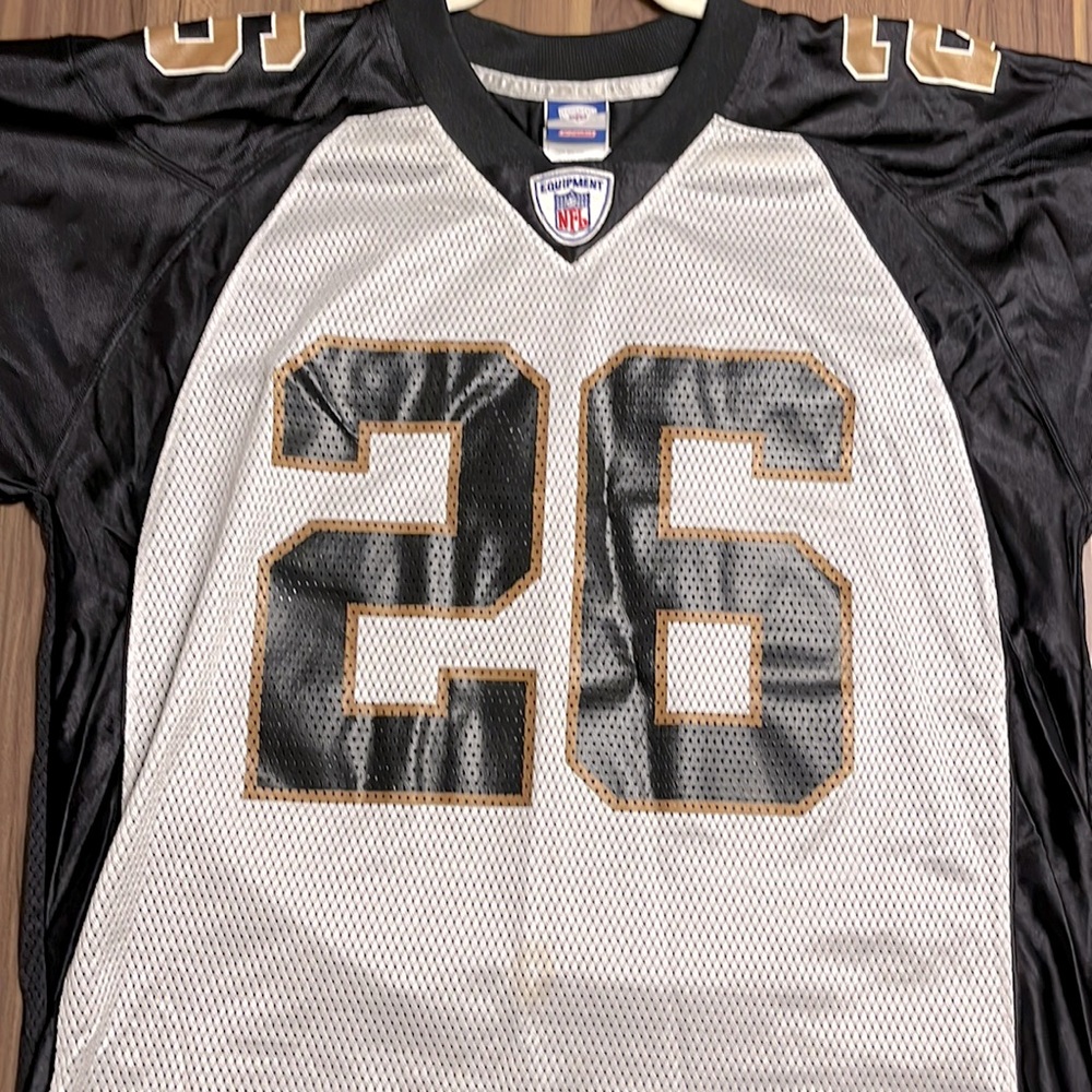 New Orleans Saints jersey size medium black and gold #26 vintage McCallister